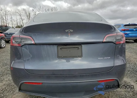 2023 Tesla Model Y from USA, damaged, VIN 7SAYGDEE9PF937048